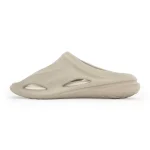 Side profile view of Red Tape slide showing ergonomic arch support, comfortable footbed, and lightweight EVA construction
