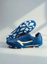 “Stylish blue Bengal football boots for men with white logo, durable design for soccer and turf play, shown with box.”