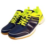 Pair of Li-Ning badminton court shoes in navy and lime, viewed from a slight front angle.