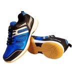 Li-Ning badminton court shoe in blue and black, with the gum rubber sole facing up to show the excellent traction pattern for court play.