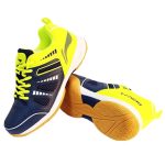 Dynamic view of Li-Ning navy and lime badminton court shoes, showing both upper and sole details.
