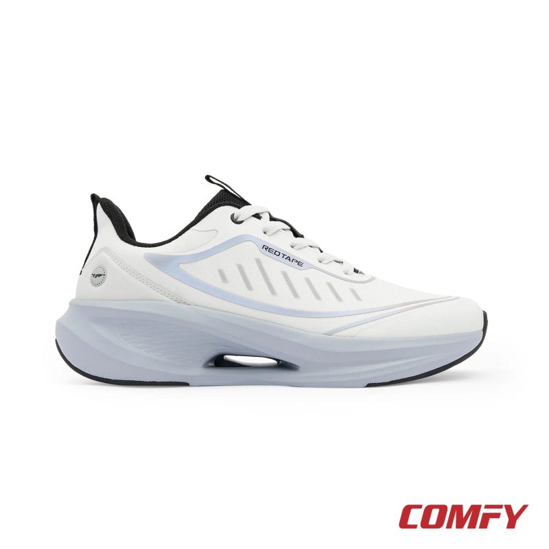 Right side profile of a men's white athleisure sports shoe, showcasing its ergonomic design and cushioned sole.