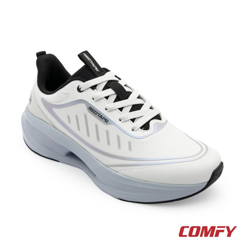 White athleisure sports shoe for men, shown from a front-right angle, featuring a sculpted light grey sole and breathable upper.