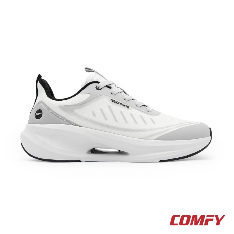 Left side profile of Red Tape men's grey athleisure sports shoe with breathable mesh and cushioned sole.