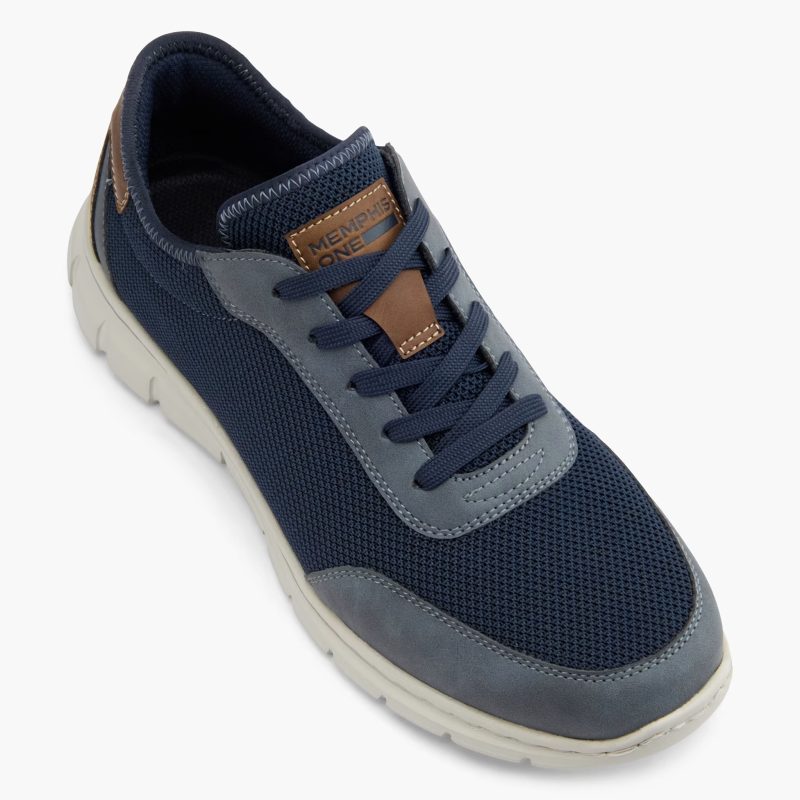 Angled top-down view of Memphis One blue men's sneaker, showing navy mesh upper, grey details, and brown brand tag.