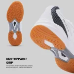 Dynamic view of Redtape men's badminton shoes outsoles, emphasizing 'UNSTOPPABLE GRIP' for maximum traction and stability on court.