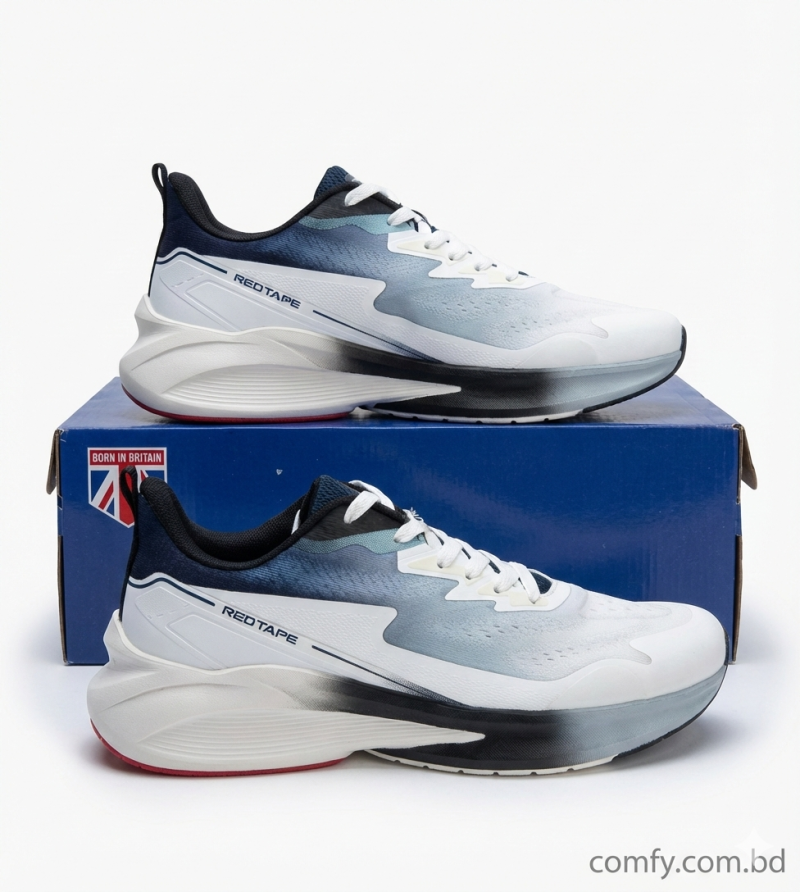 Men's white and navy sports keds by RedTape, featuring a modern gradient design, presented atop its branded shoebox.