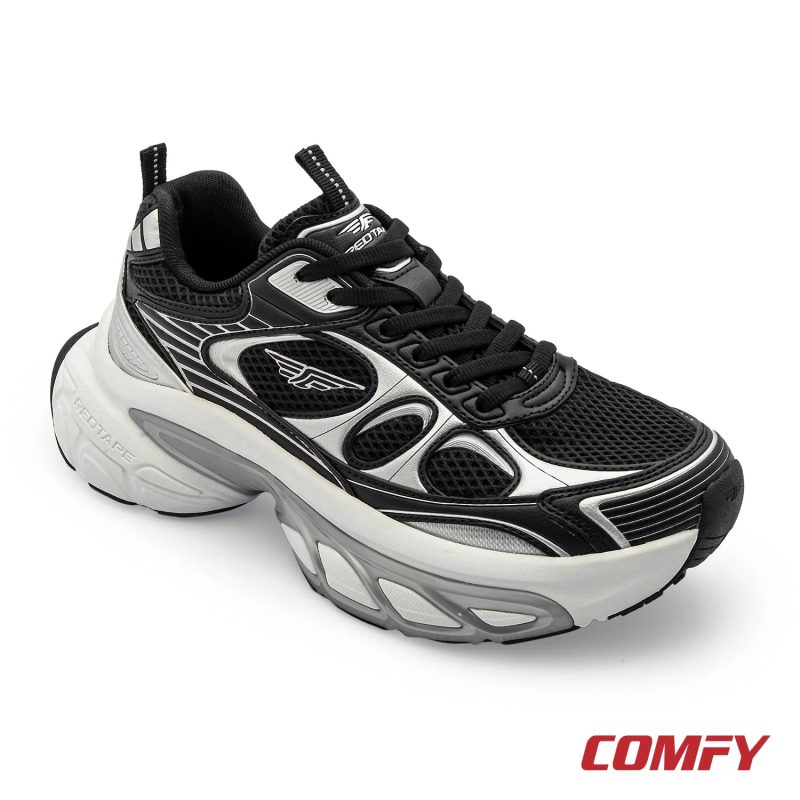 Angled front view of a Red Tape women's black and silver chunky casual shoe with a distinctive white sole.