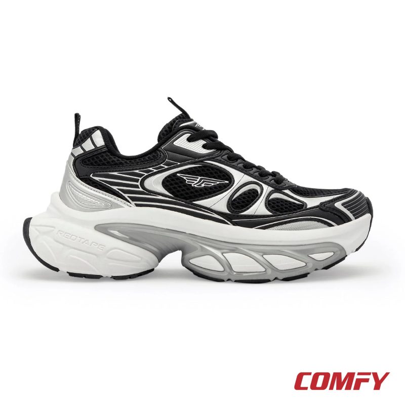 Right side profile of a Red Tape black and silver chunky casual shoe for women, showcasing its robust design.