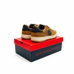 Rear view of Benetton men's brown and tan lifestyle sneakers with dark blue accents, sitting on a red and black Benetton shoe box.