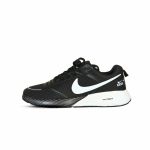 Single black Nike Zoom running shoe, white swoosh, side view on clean white background, demonstrating sleek profile.