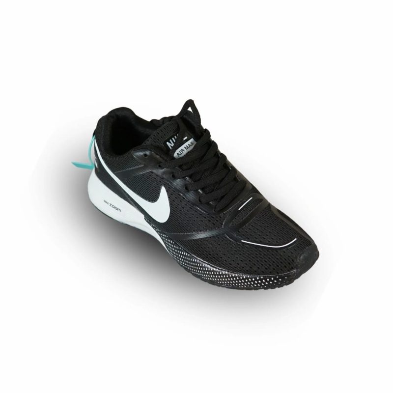 Side profile of a black Nike Zoom running shoe with a white swoosh, white midsole, and breathable mesh upper on white.