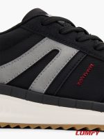 Close-up of side stripes and red stitching on Bench men's black sneakers.