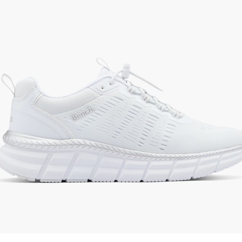 Side view of Bench White Slip-On Trainer featuring white mesh upper and thick white sole with silver accent.