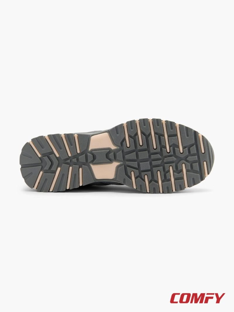 Close-up of the rugged outdoor grip outsole tread pattern.