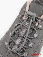 Detailed close-up of quick-release toggle laces on grey walking shoes.