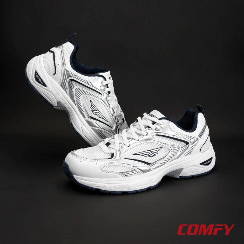 Red Tape casual shoes displayed on a sleek dark grey background showing off the design.