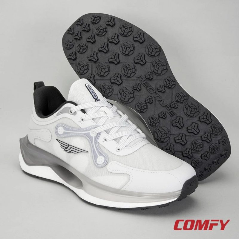 Grey Red Tape ETPU sneaker standing upright next to its textured rubber outsole.