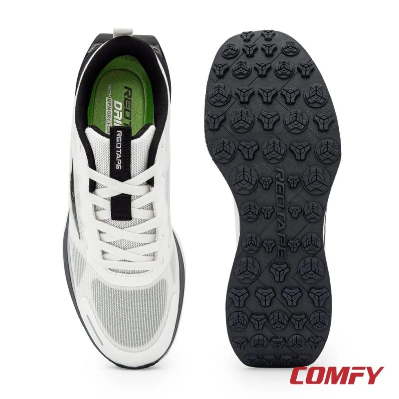 Top-down view showing green memory foam insole and black textured outsole.