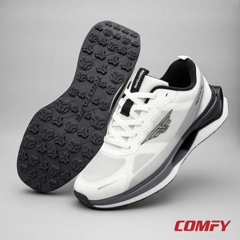 Dynamic studio layout of Red Tape ETPU sports shoes.