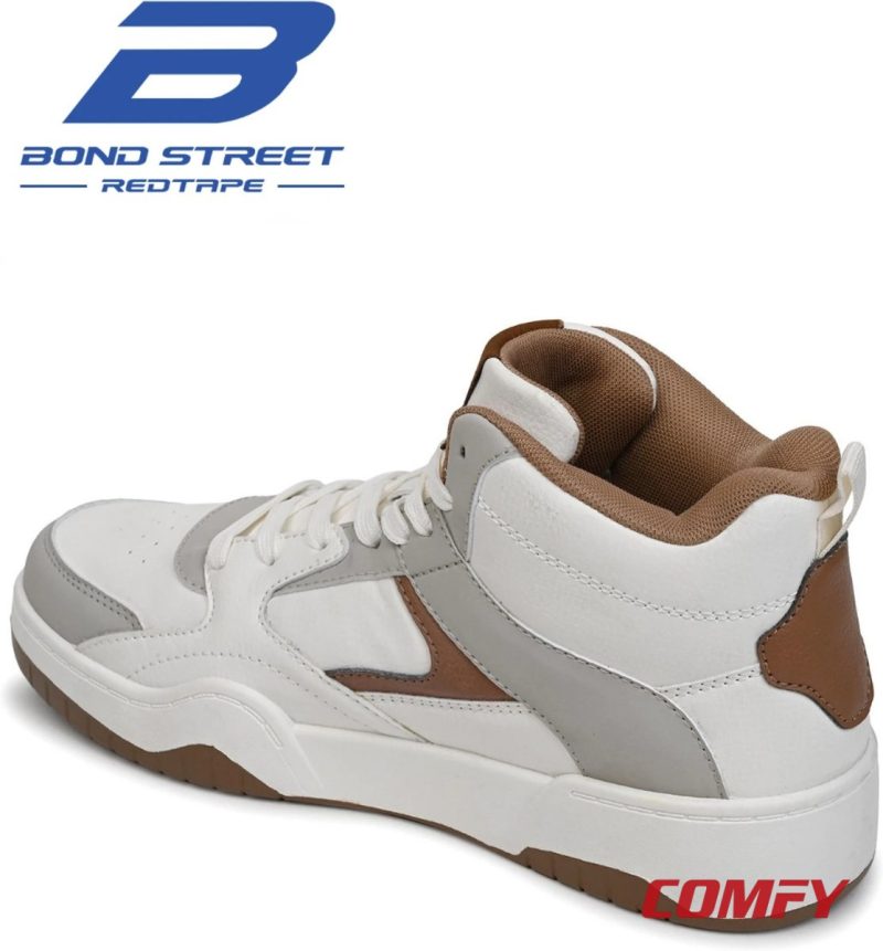 Three-quarter rear view of Bond Street by Red Tape sneakers highlighting heel comfort design.