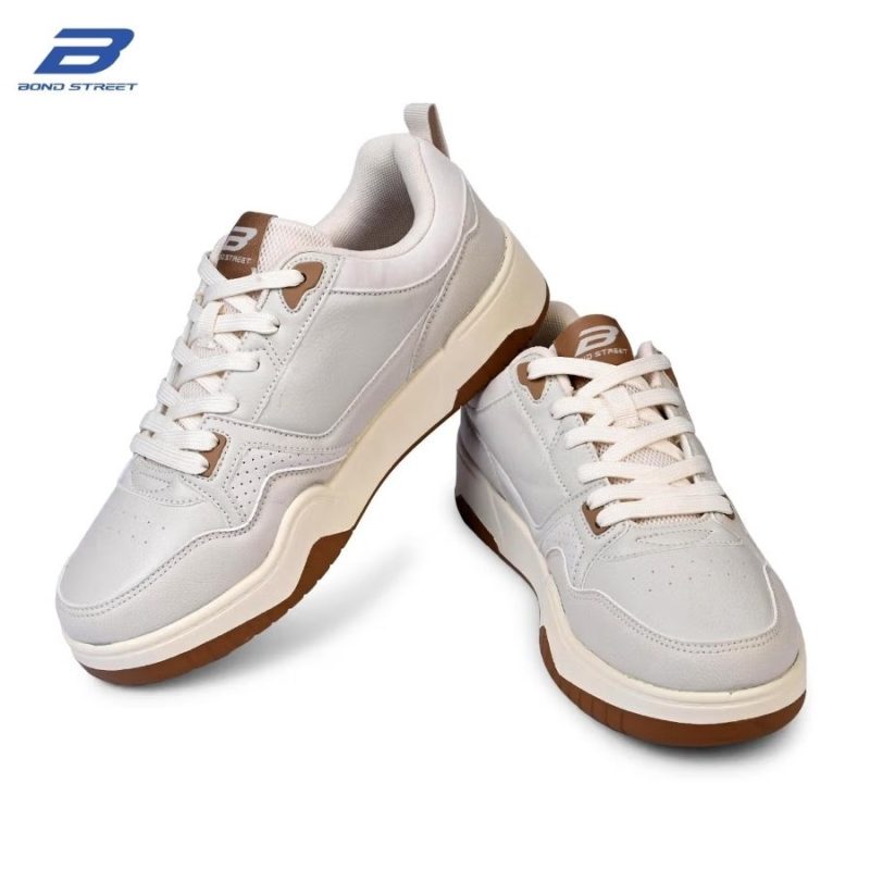 Angled front view of Bond Street beige men's court style casual sneakers.