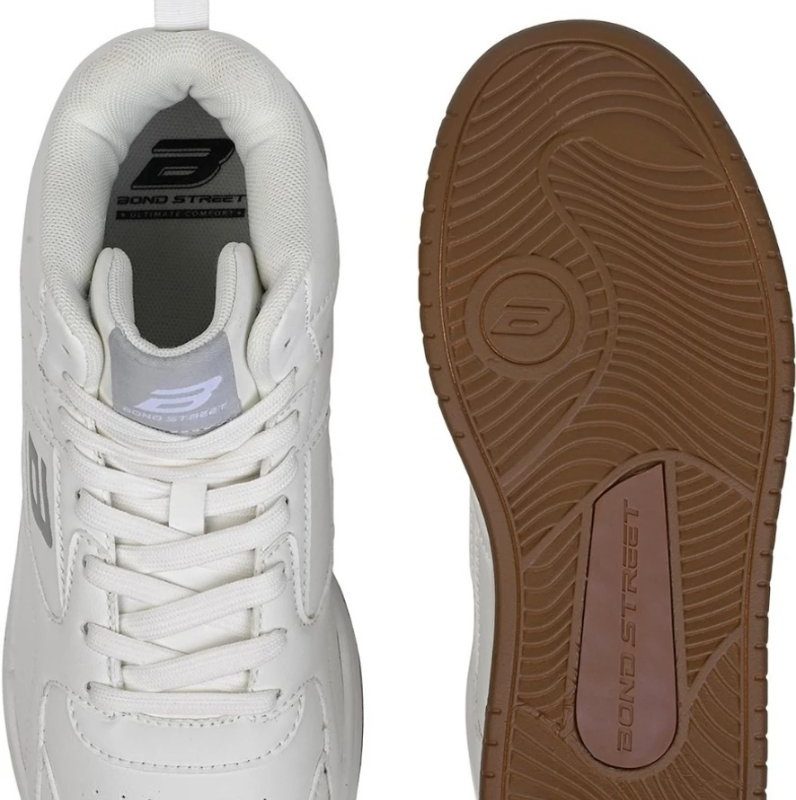 Top view of white Bond Street sneaker next to its textured tan rubber sole.