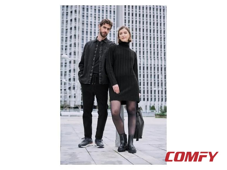 Man wearing Esmara navy blue leisure shoes standing next to a woman in a black turtleneck dress.