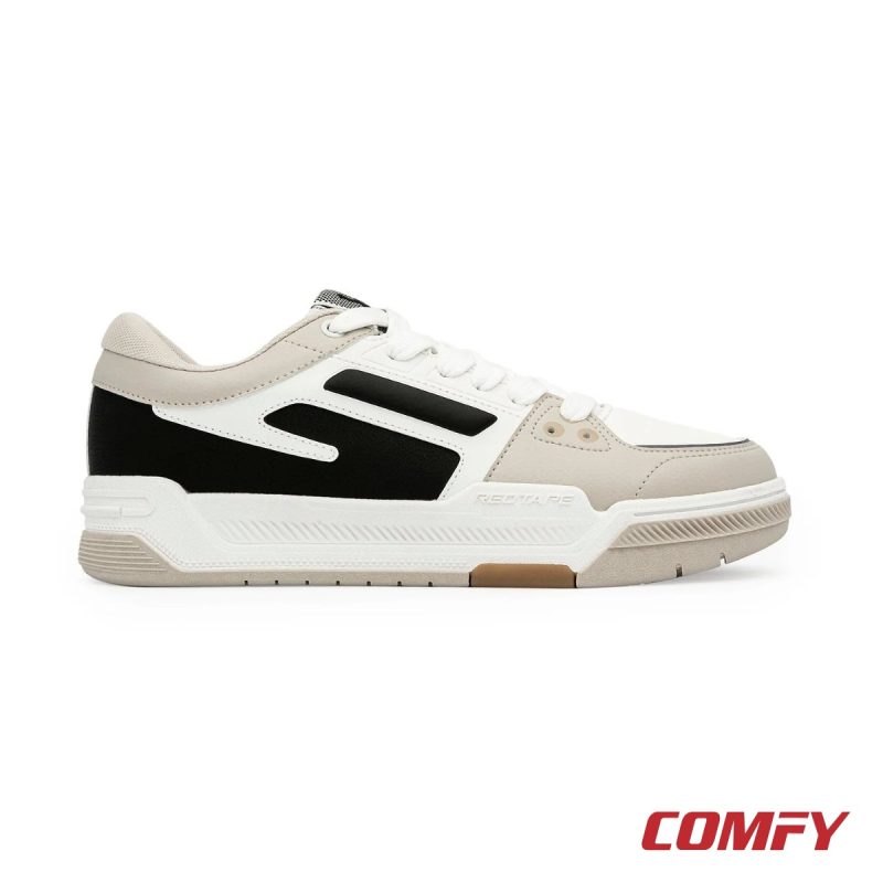 Lateral side view of Red Tape lifestyle sneakers highlighting the bold black graphic design.