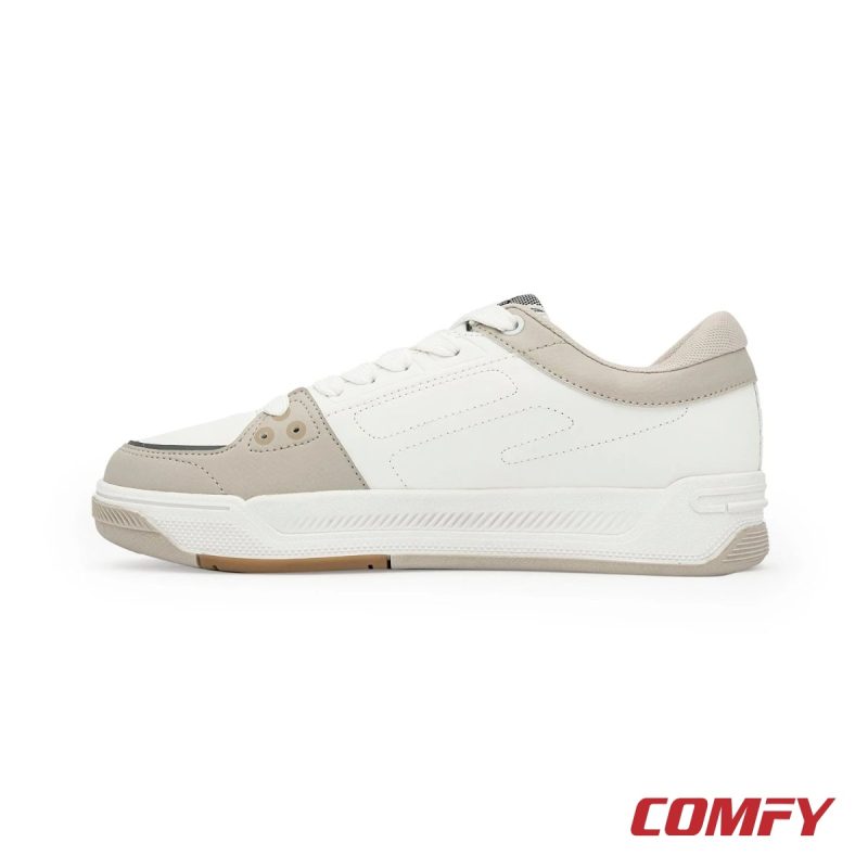 Medial side view of Red Tape lifestyle sneakers showing minimalist white and beige paneling.