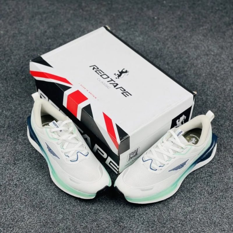 Pair of Redtape Classic Velocity Pro white and sea green athletic sneakers