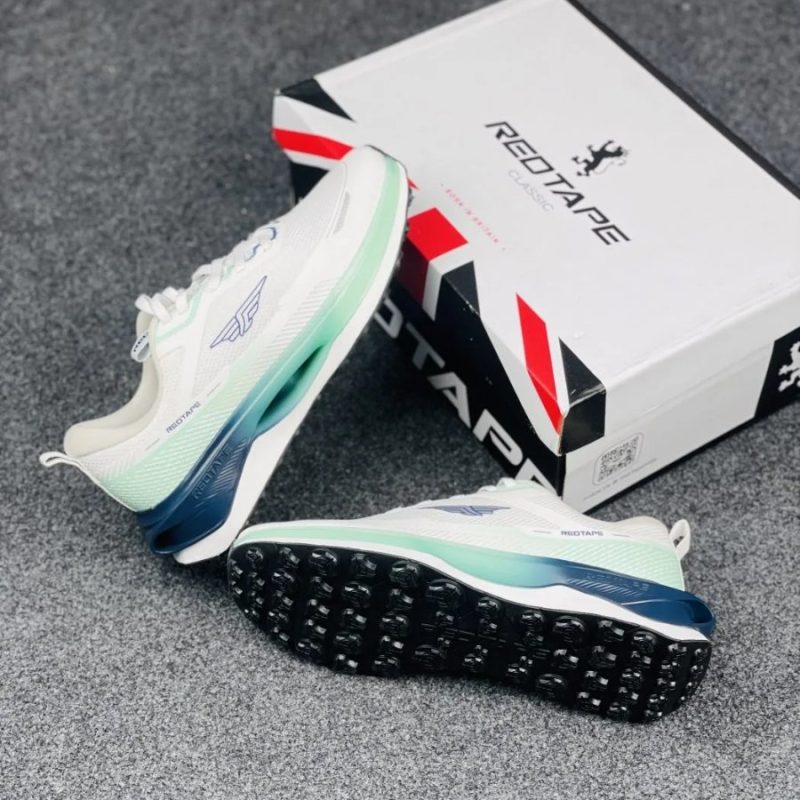 Redtape Classic Velocity Pro sneaker with black rugged outsole next to shoe box