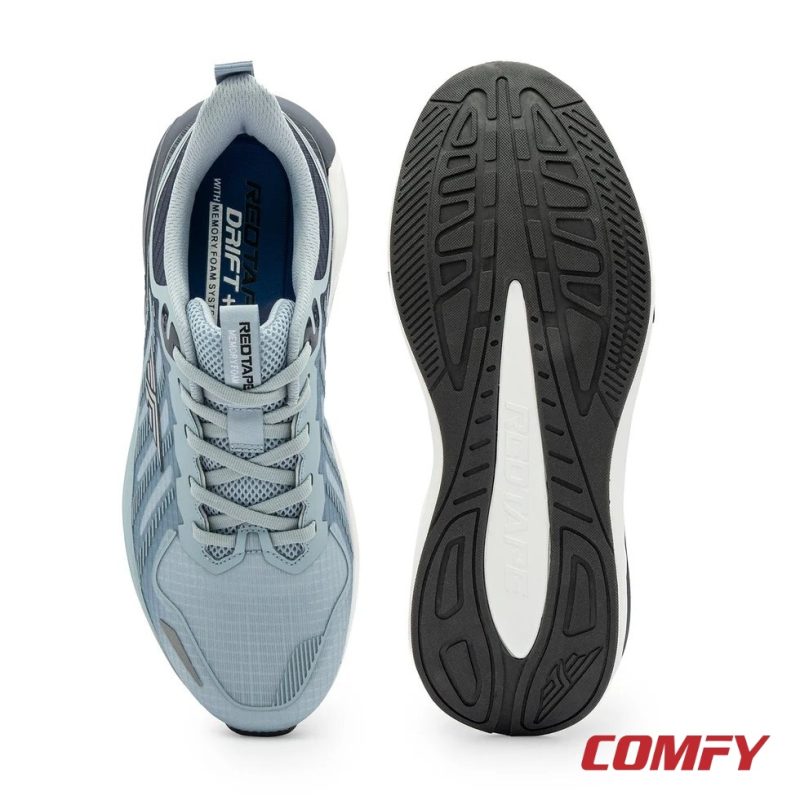 Top-down view of the blue memory foam insole and bottom view of the textured black outsole grip pattern.